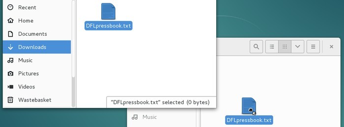 drag and drop: move the mouse into the destination folder